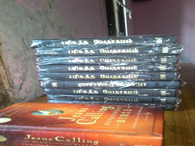 Tamil bought new Bibles in the Tamil language for his new Church.